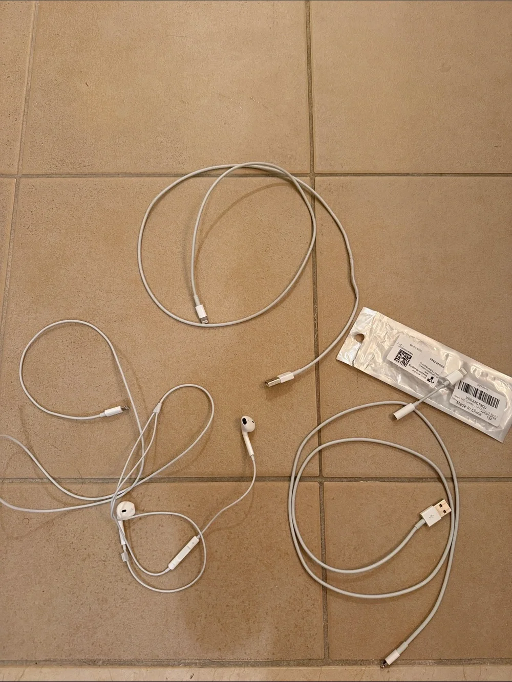 Apple White Lightning Cables and Wired Earbuds